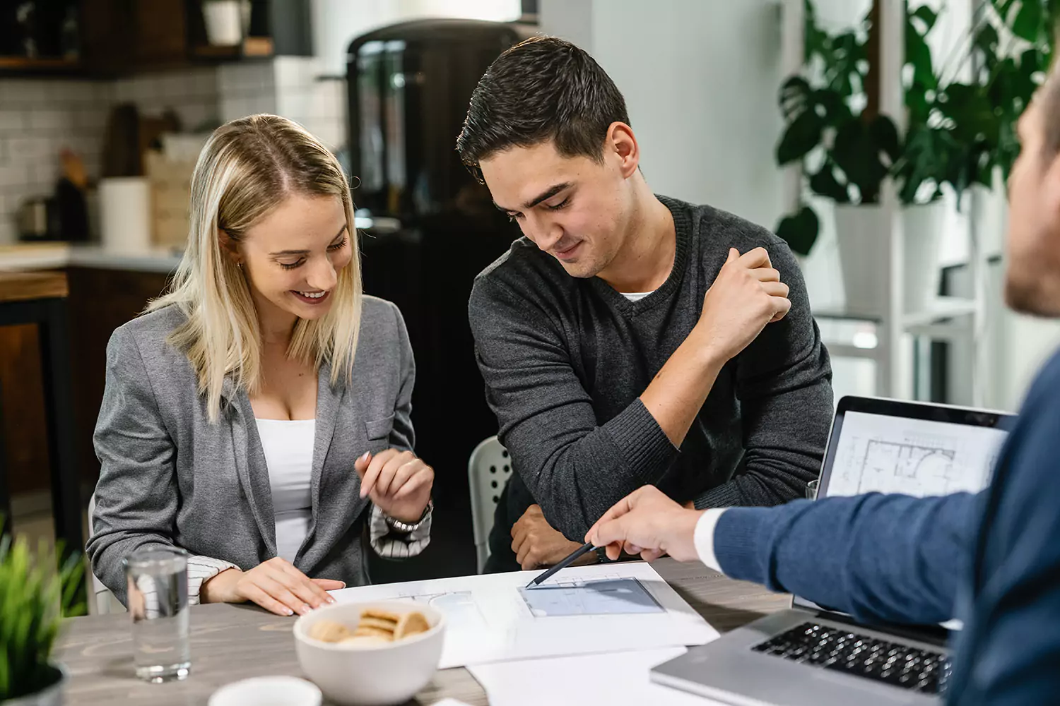 Young couple looking at financial solutions